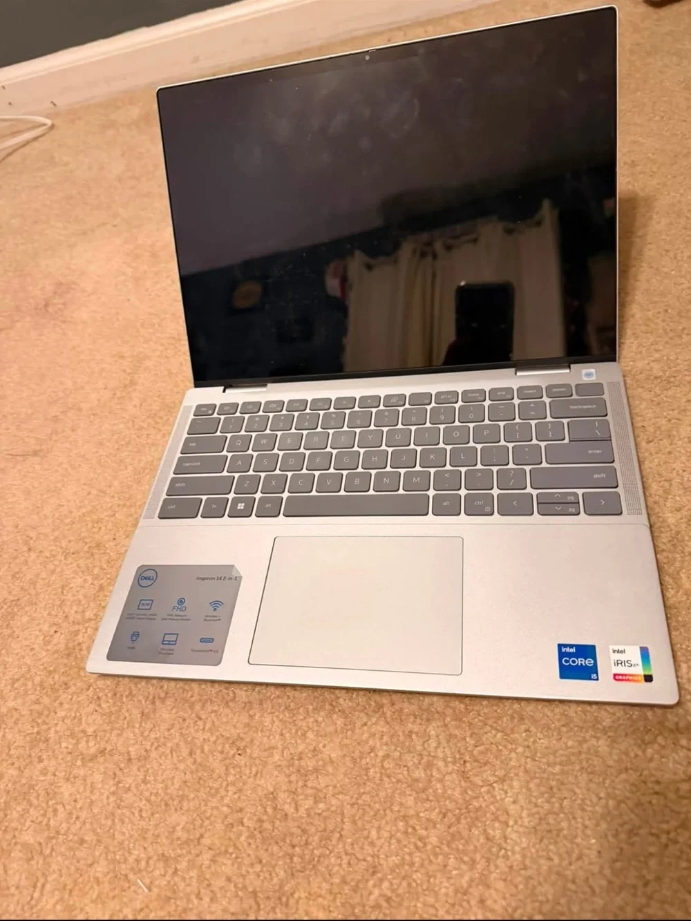 Dell Silver Laptop with Colorful Floral and Graphic Stickers
